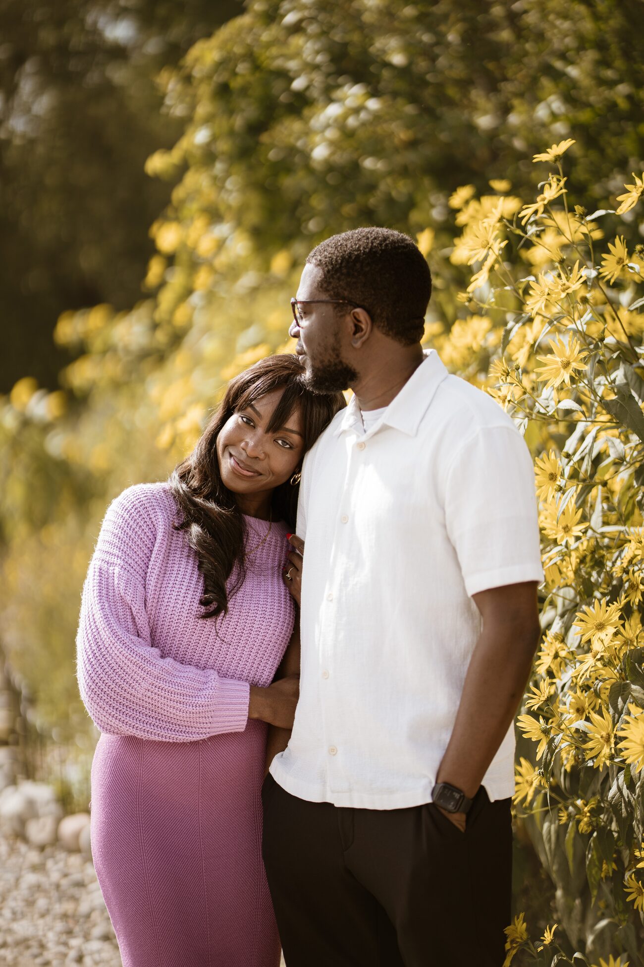 Couple among golden autumn foliage
