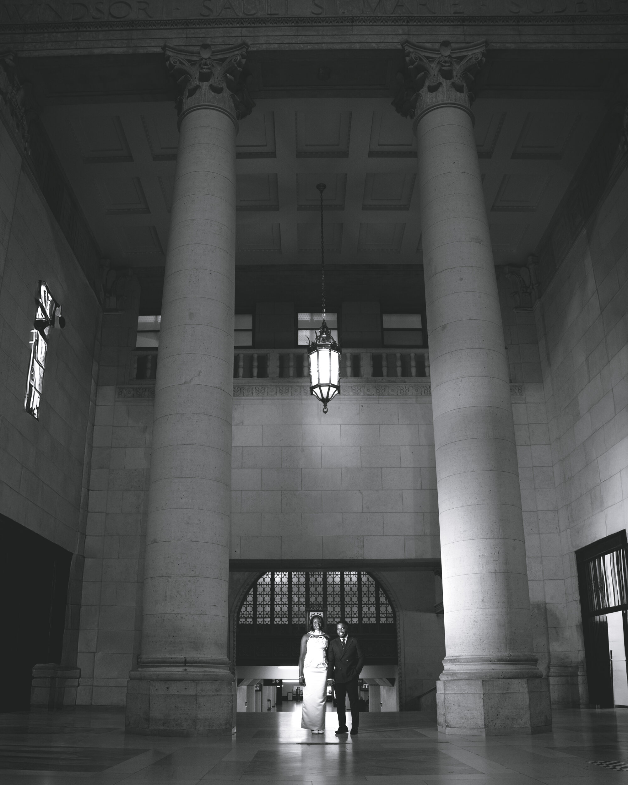 Couple in a grand columned hall