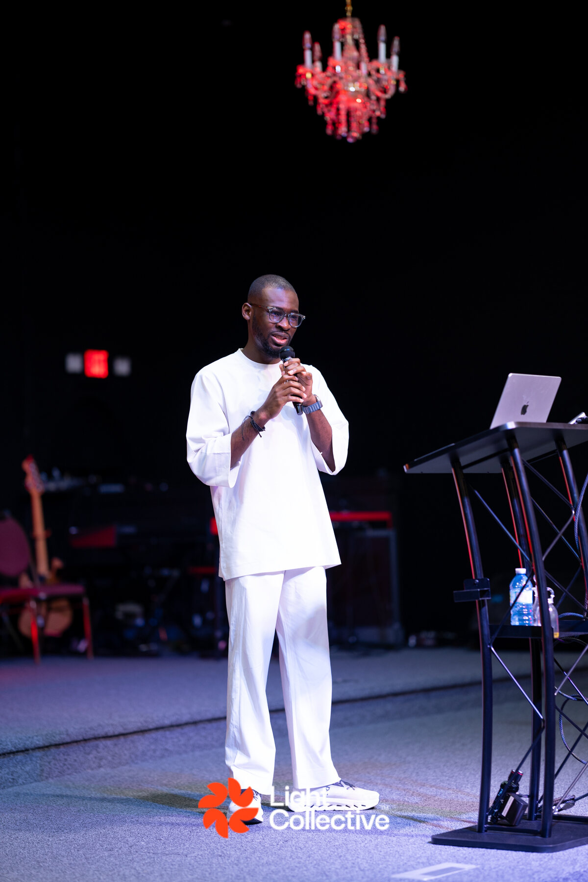 Fadareak speaking on stage at Light Collective 2026