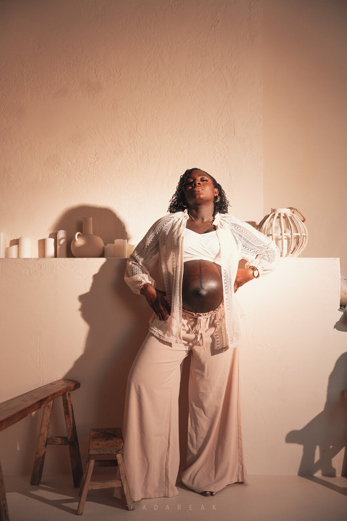 Expectant mother in soft natural light