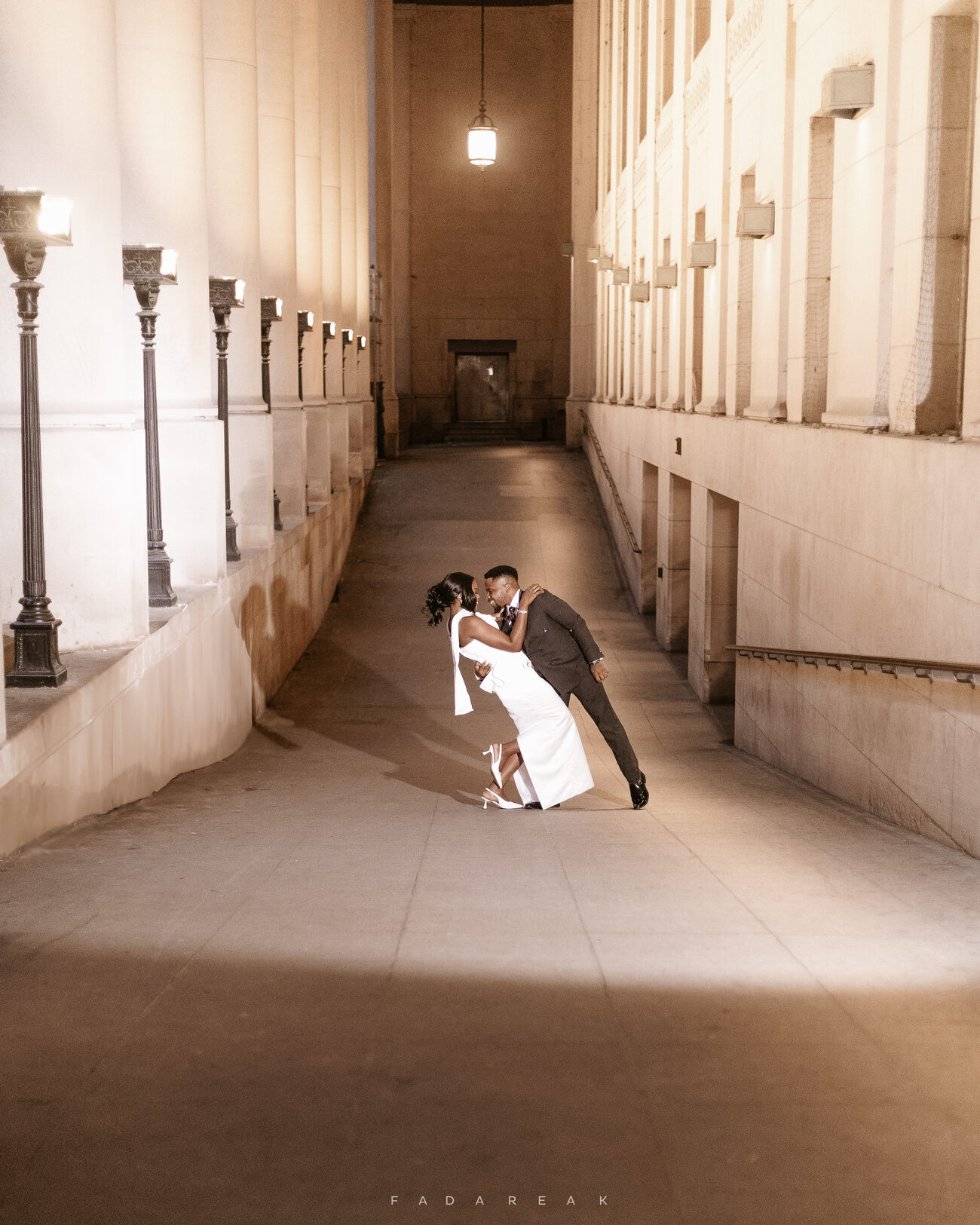Couple in an architectural hallway