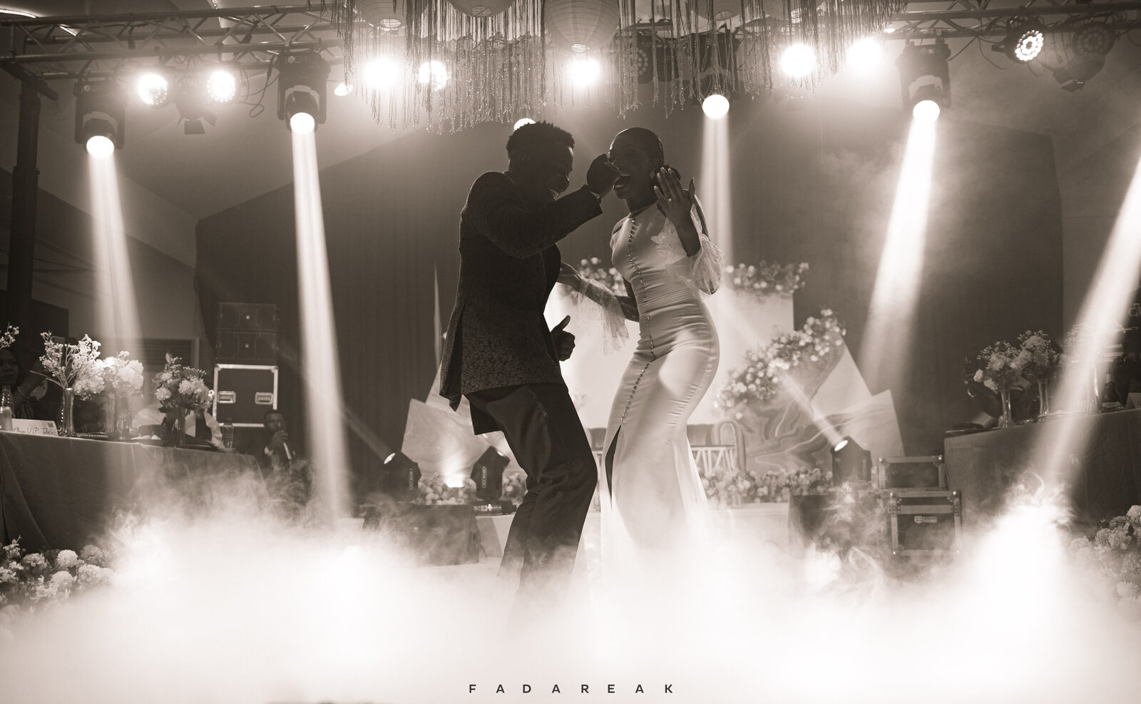 Couple dancing in smoke, black and white