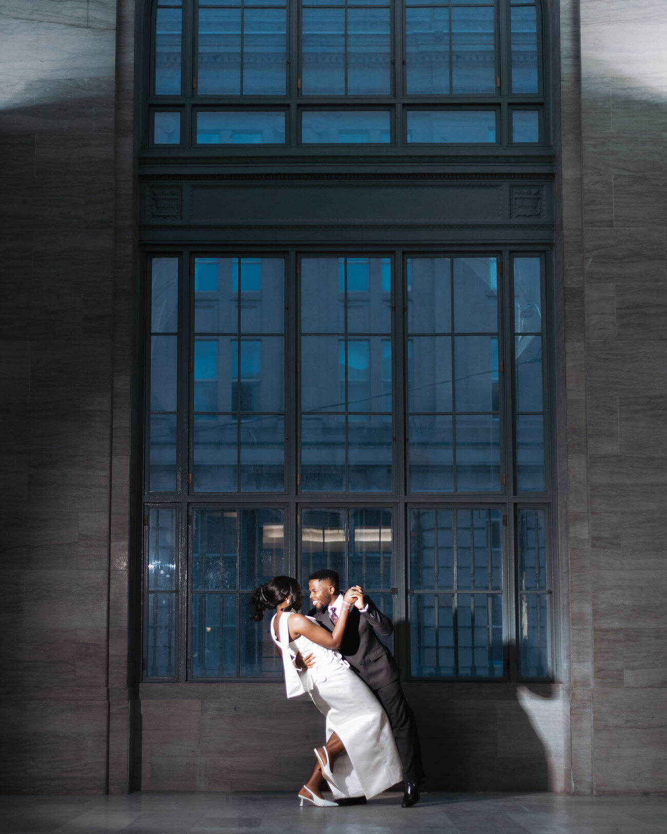 Couple by a window
